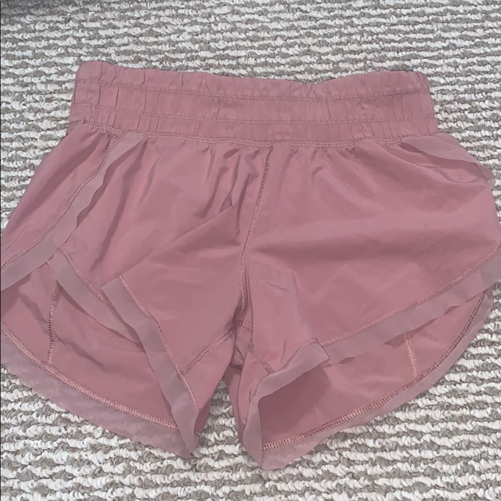 Light pink lulu lemon athletic shorts